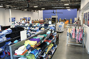 A photo of the SC4K store showing clothing and supplies